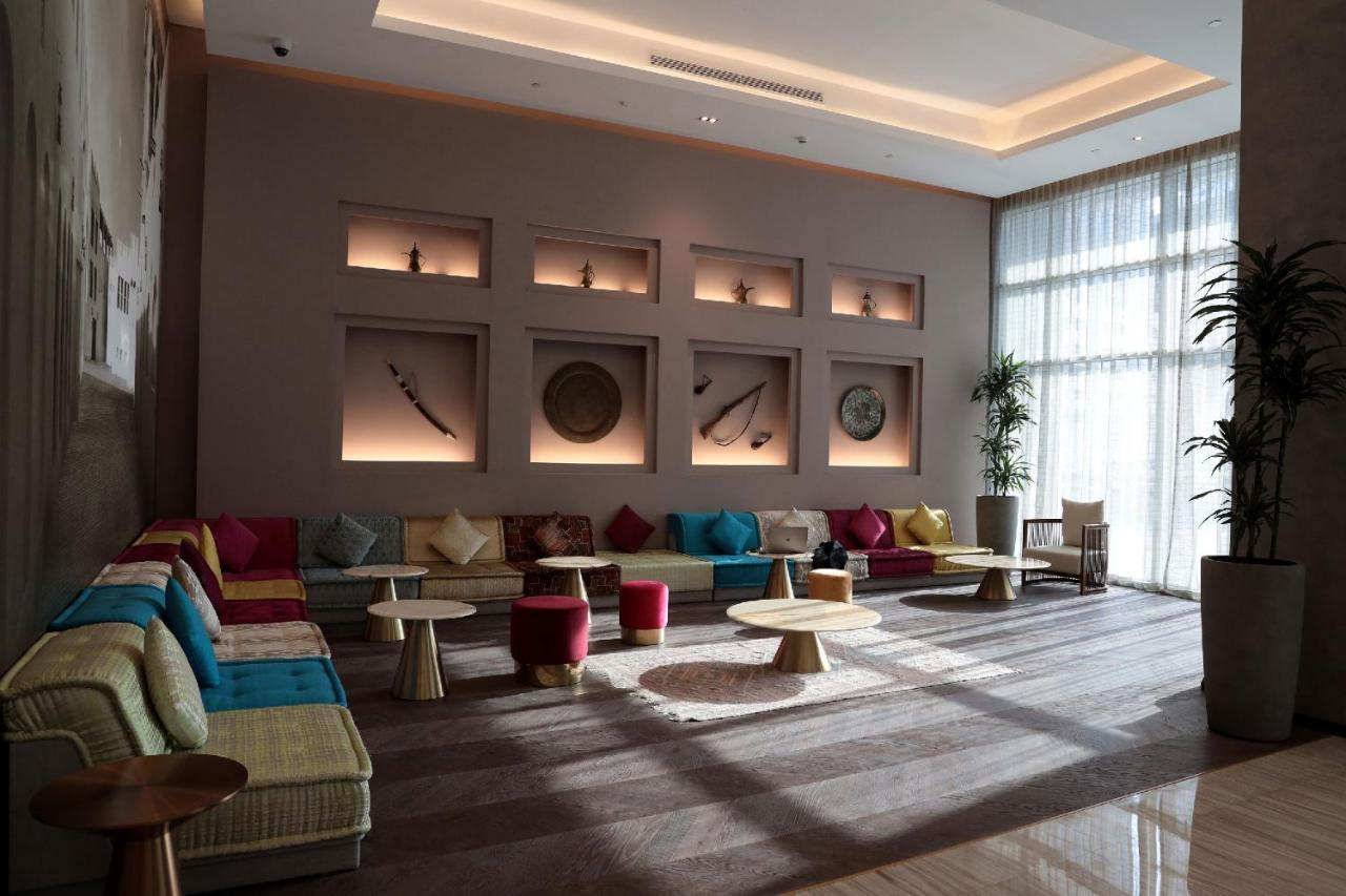 Pullman Sharjah Hotel Exterior foto The lobby of the hotel