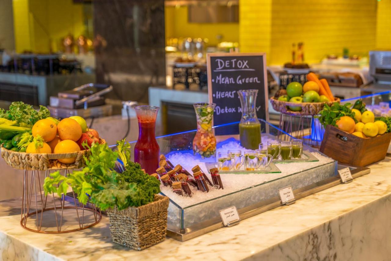 Pullman Sharjah Hotel Exterior foto Healthy food at a buffet